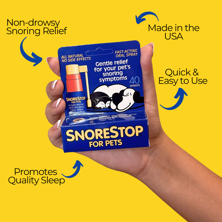 Hand holding SnoreStop for Pets spray packaging with benefits like non-drowsy relief and easy use on yellow background